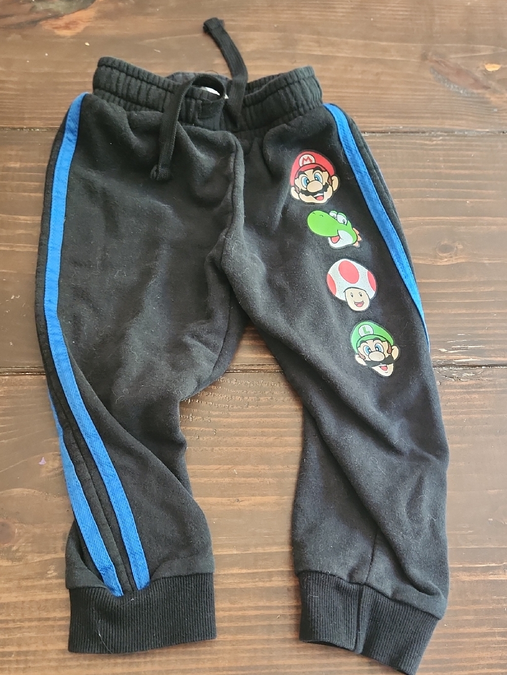 Nintendo Black Joggers with Blue Side Stripes and Mario Graphics
